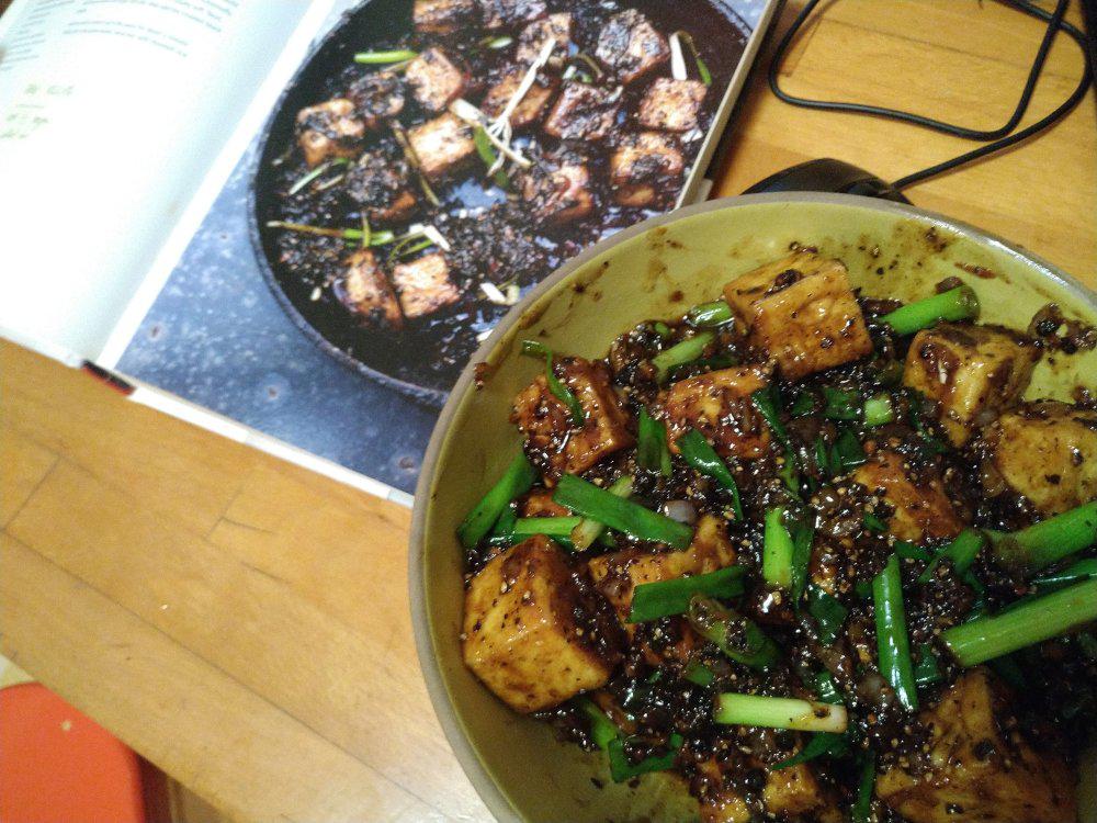 tofu prepared, next to cookbook photo